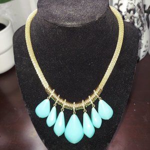 Gold necklace with acrylic teal teardrops